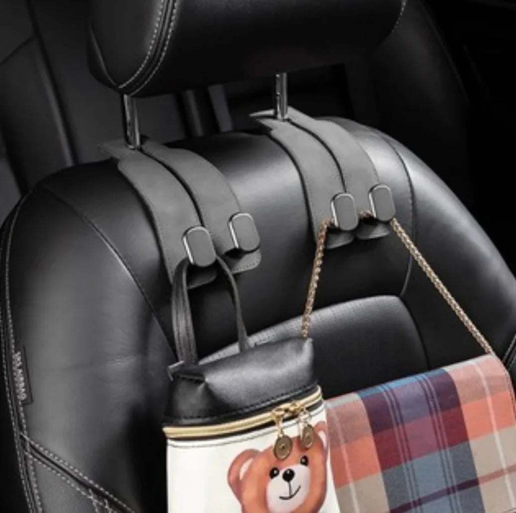 Gancho organizador DRIVOX instalado en el cabezal del asiento